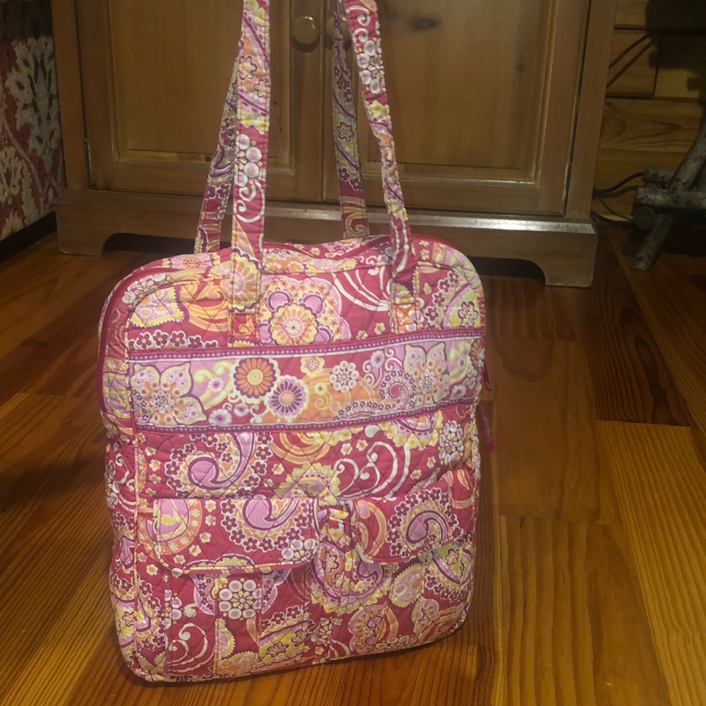 Vera Bradley purse with red pink orange yellow and white. Measures 14x11x3